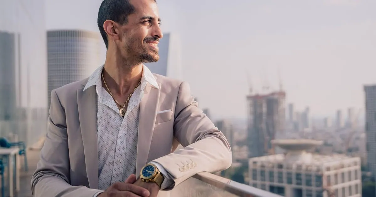 A professional in his 40s in business attire, representing a confident career change at midlife
